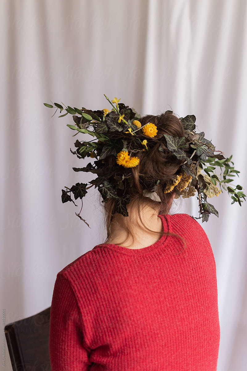 Aesthetic Portrait of Woman Wearing Flowers