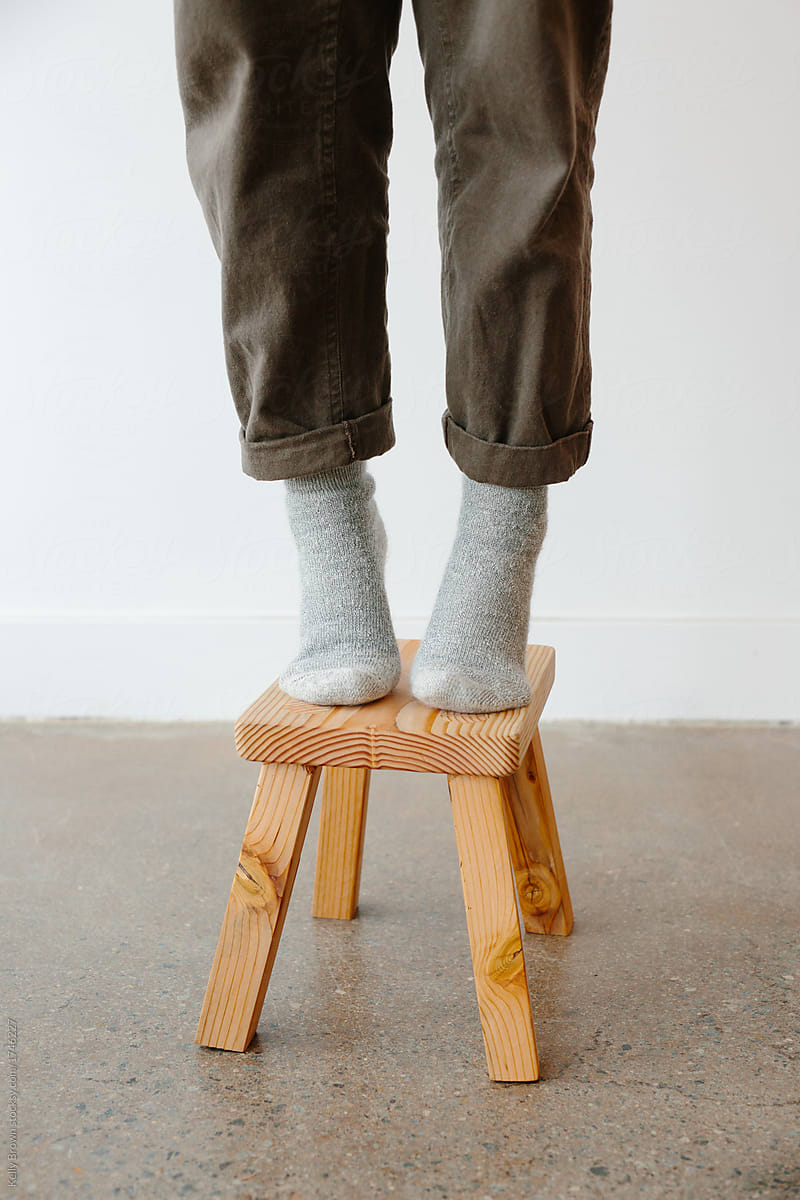 feet on a stool