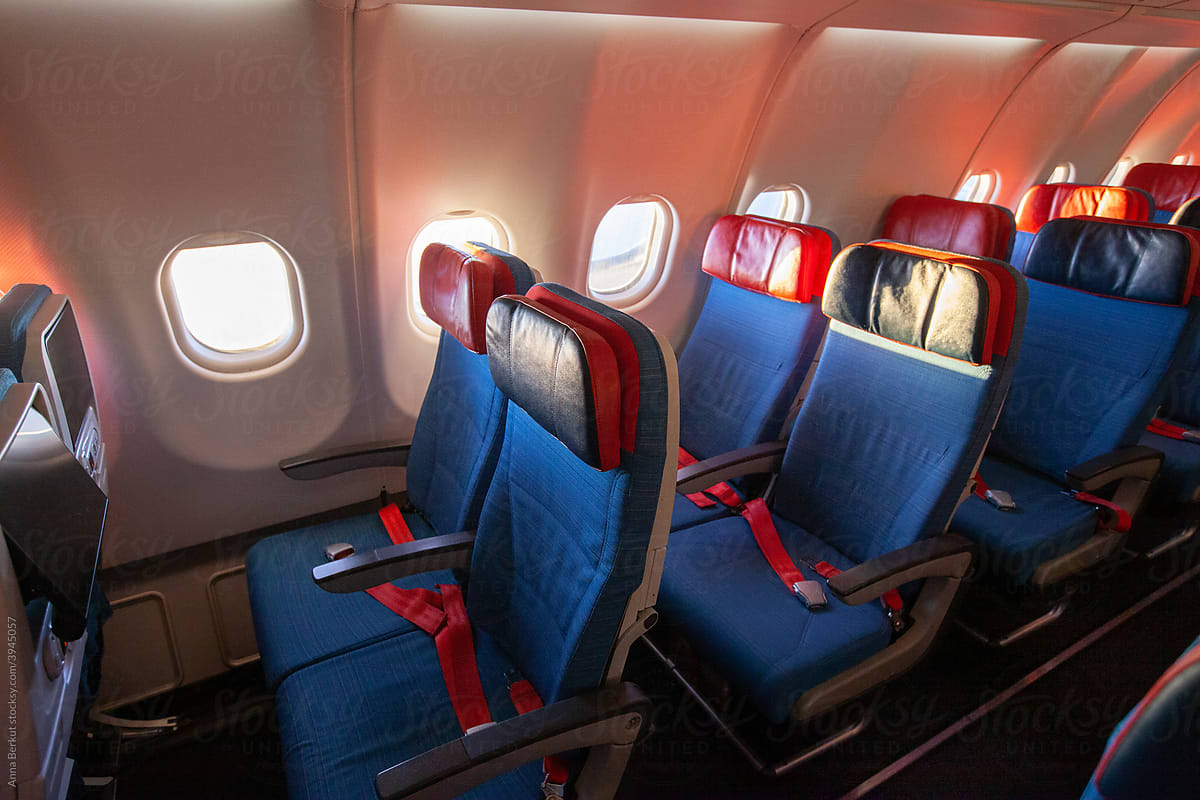 airplane interior with empty seats