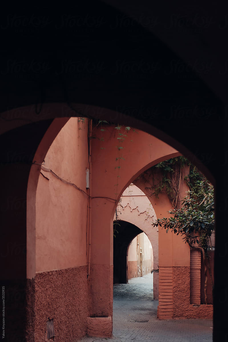 Colorful streets of morocco seen through the arches in Medina of Marrakesh