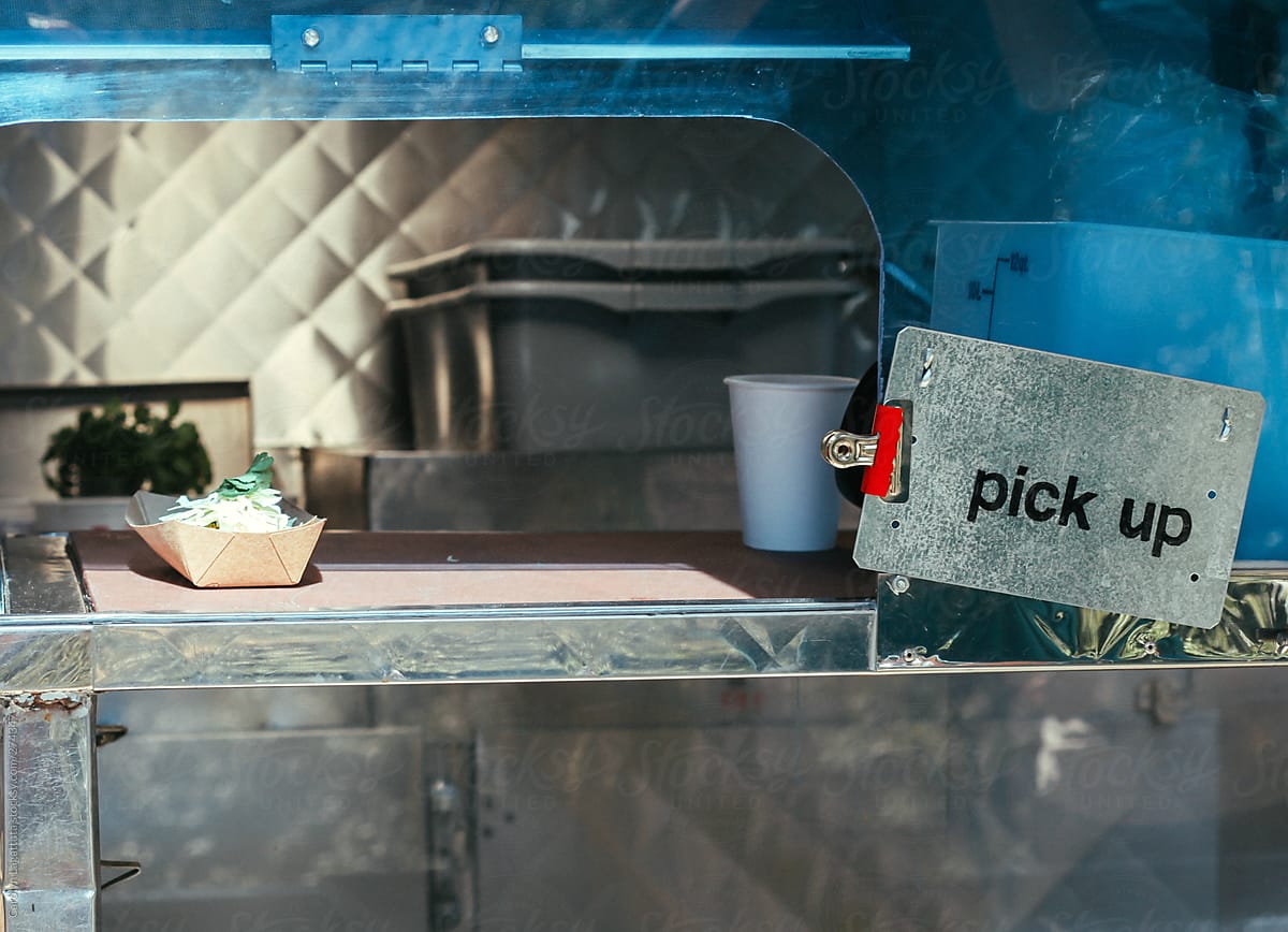 Pick up window at a food truck - food waiting