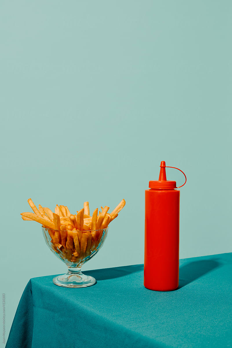 french fries and a bottle of ketchup