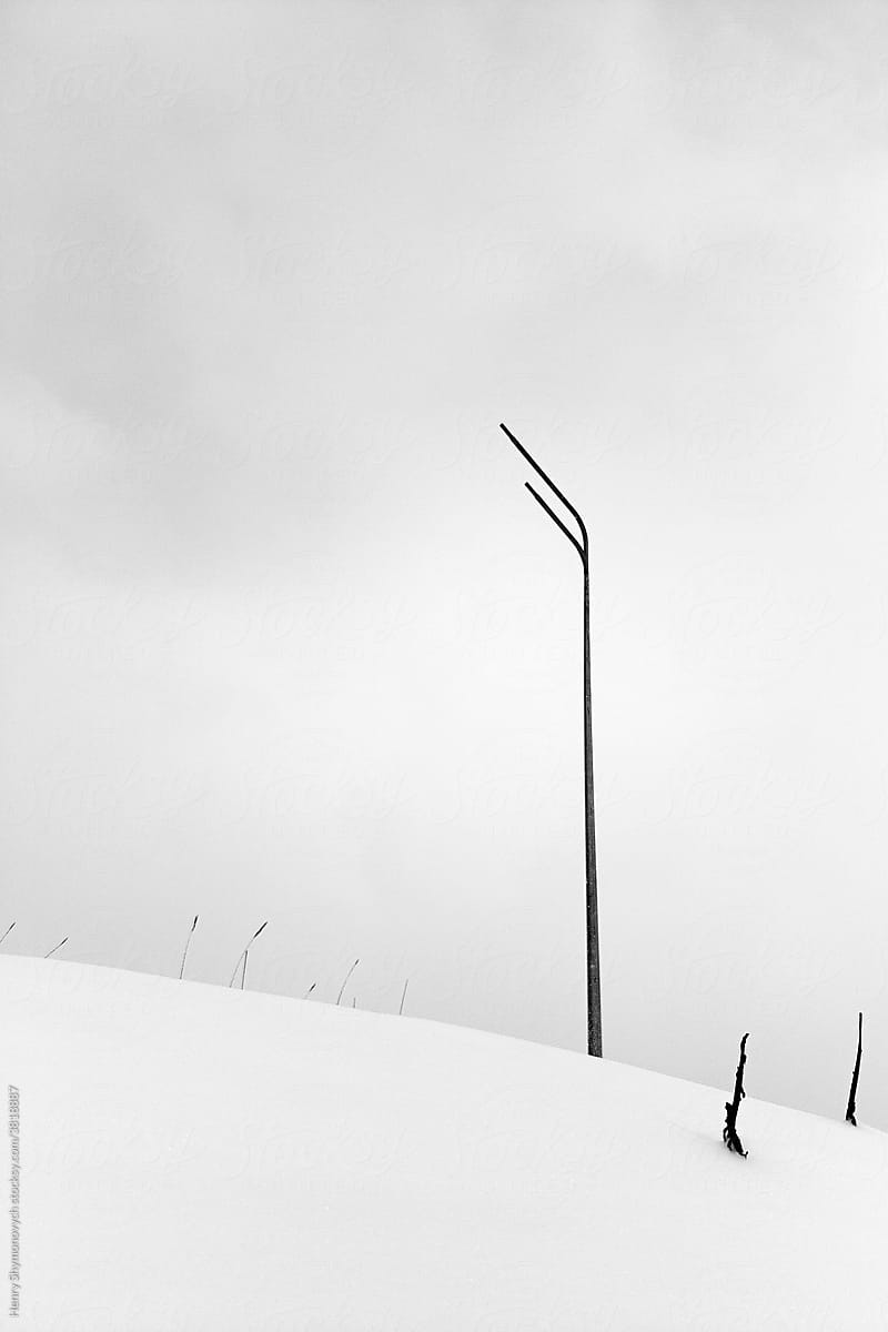 Street light pole in the snow