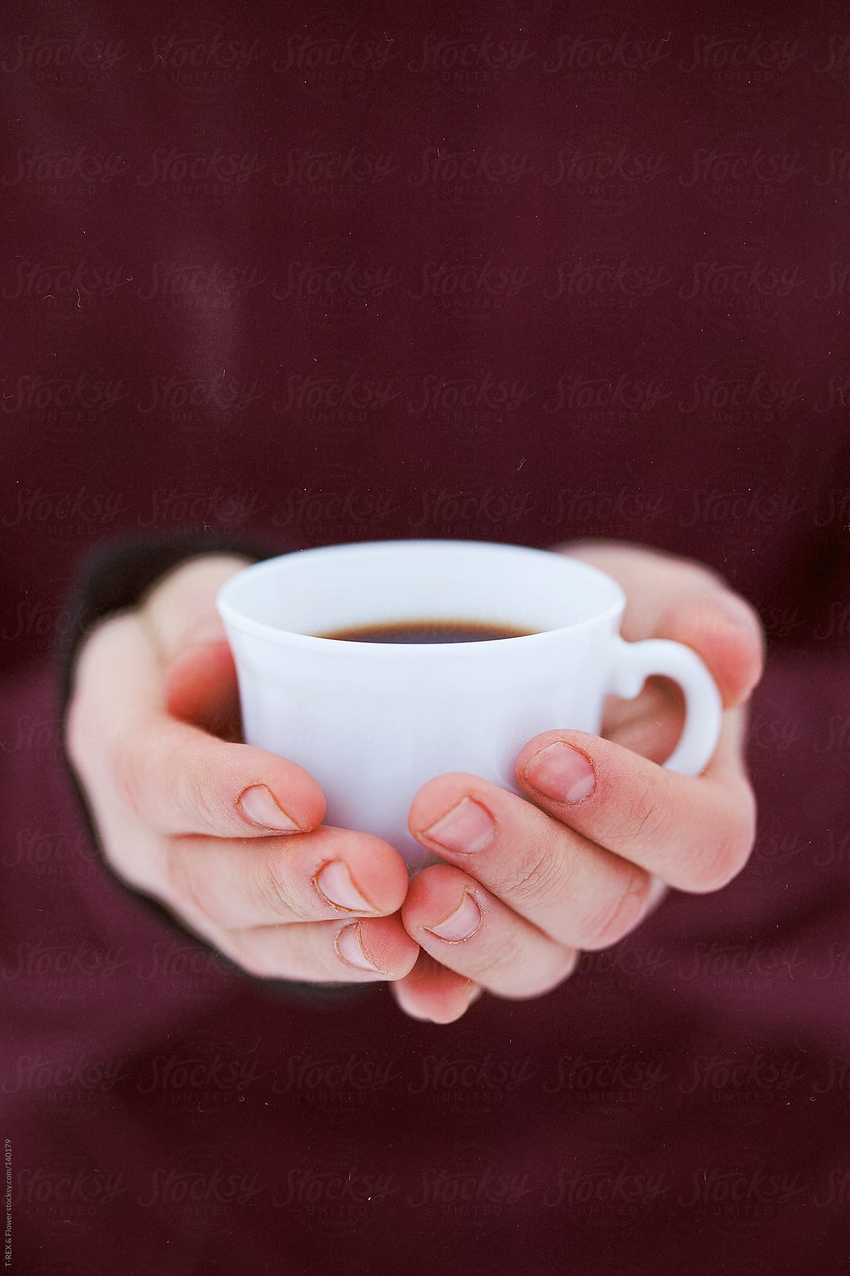 Woman holding tea cup