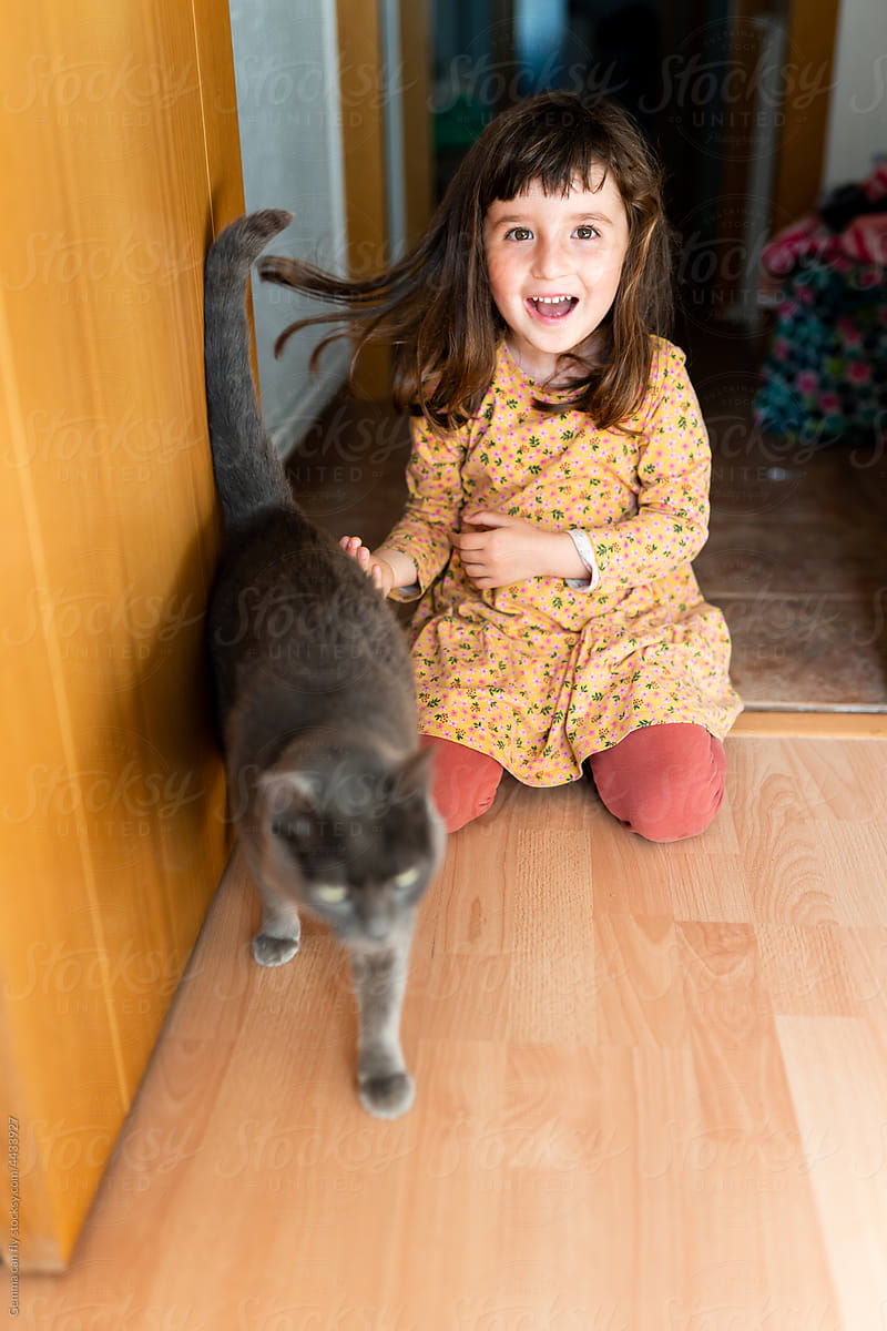 UGC - Happy girl with cat at home