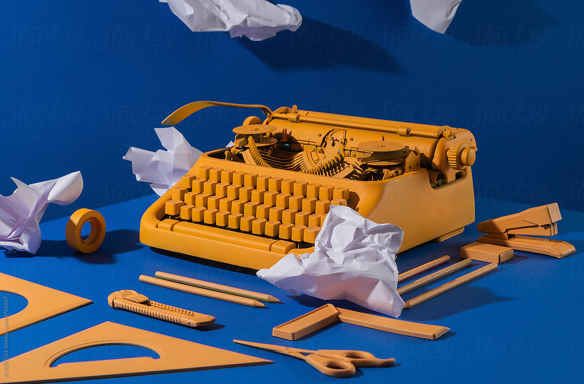 old yellow typewriter utensil blue