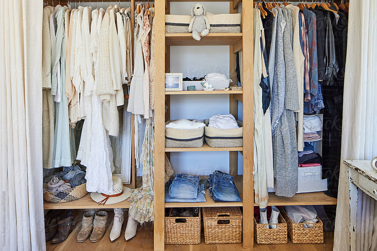 Organized closet with clothes