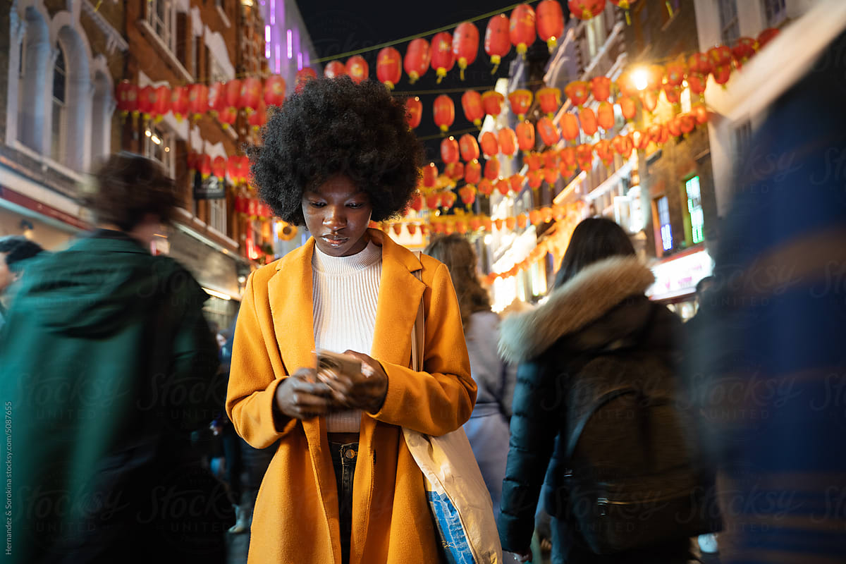 Woman Using Smartphone In London China Town