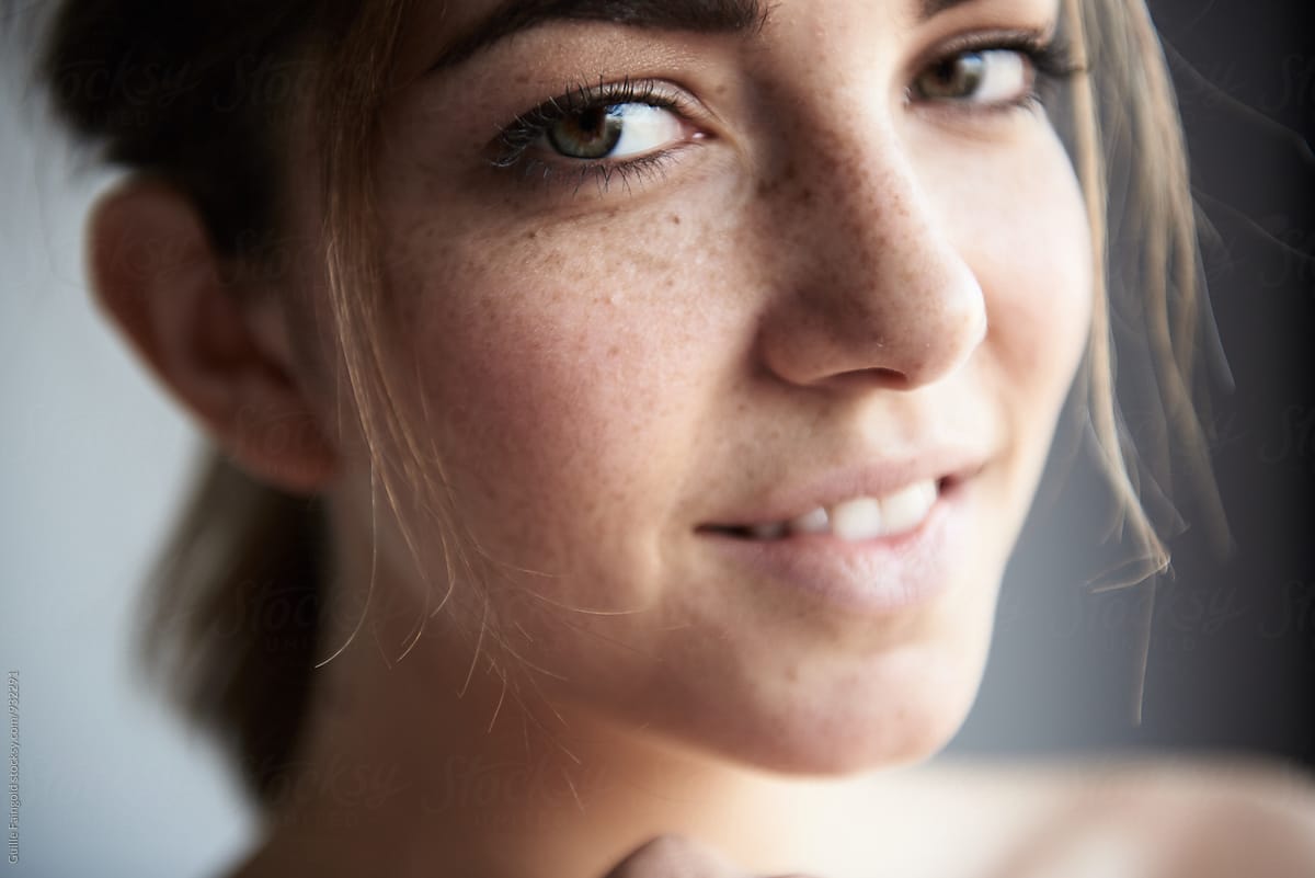 Young Freckled Woman Looking At Camera By Stocksy Contributor Guille Faingold Stocksy 