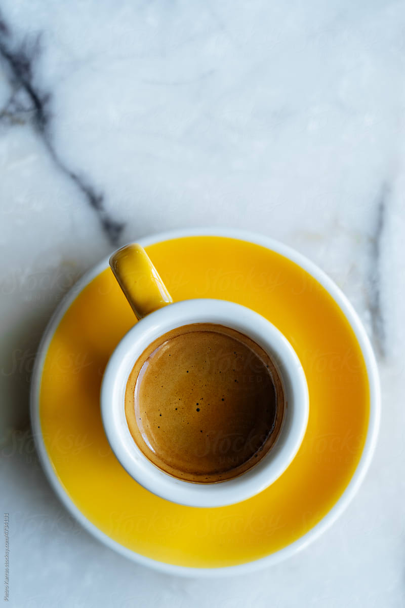 Cup of espresso on marble table