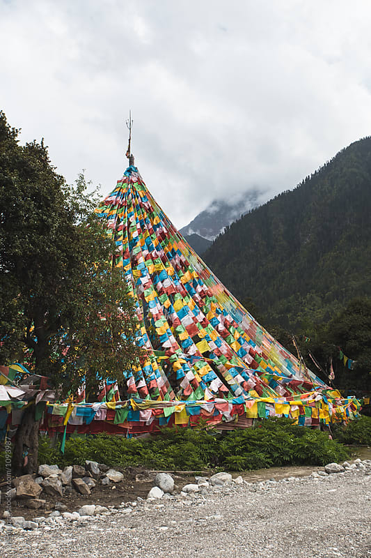 pagoda and prayer flags in the mountain