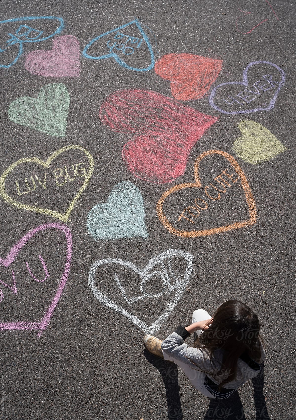 Heart chalk art and a little girl