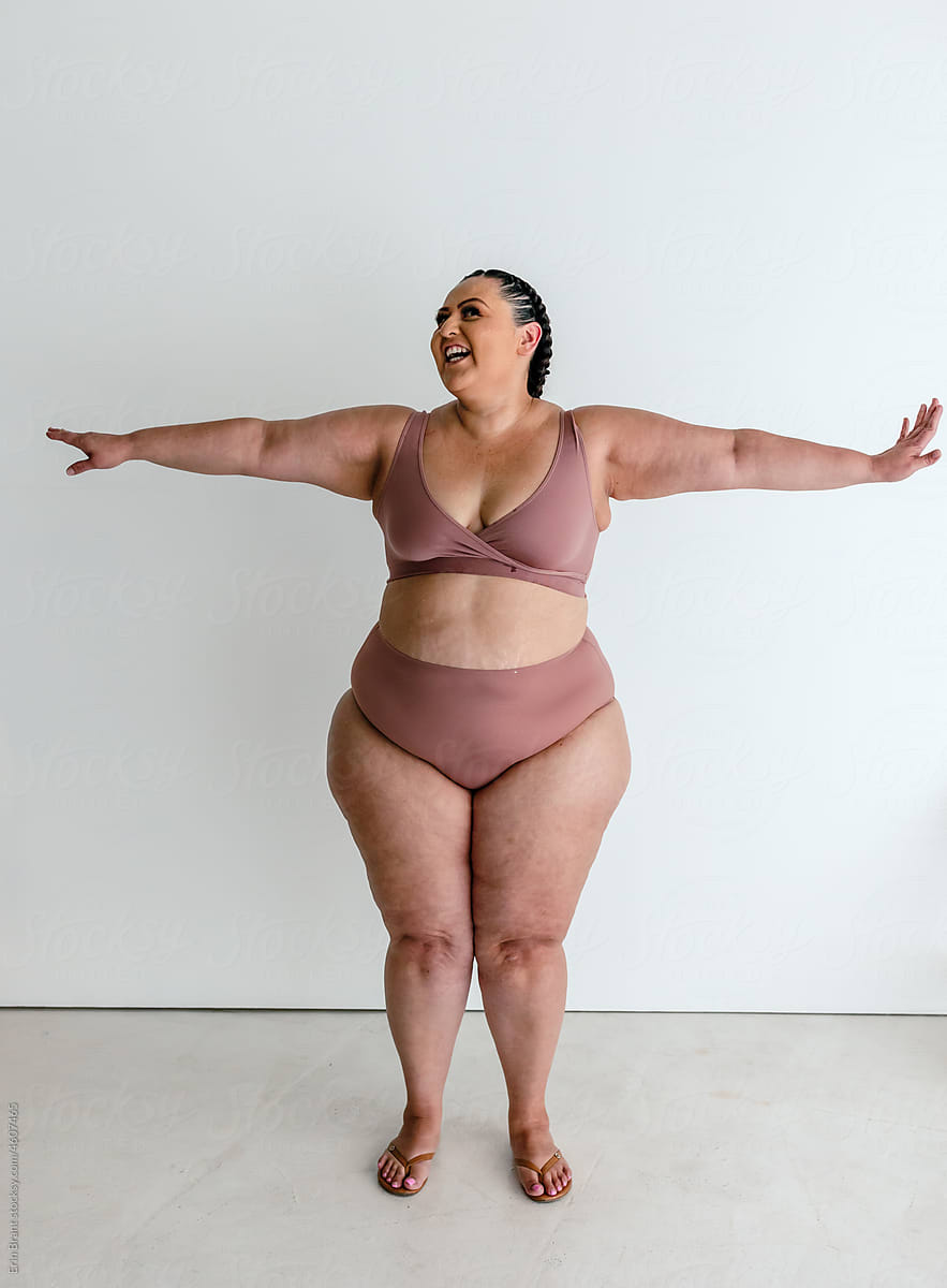 Smiling Plus-size Woman In Bra And Underwear by Stocksy Contributor Erin  Brant - Stocksy