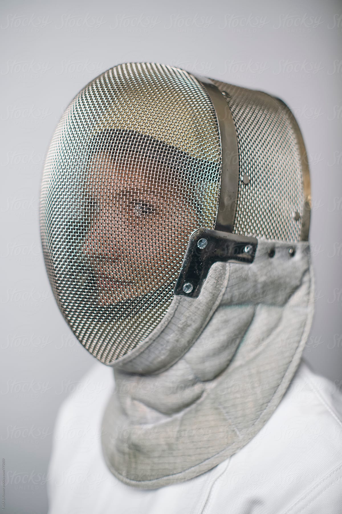 Female fencer wearing mask