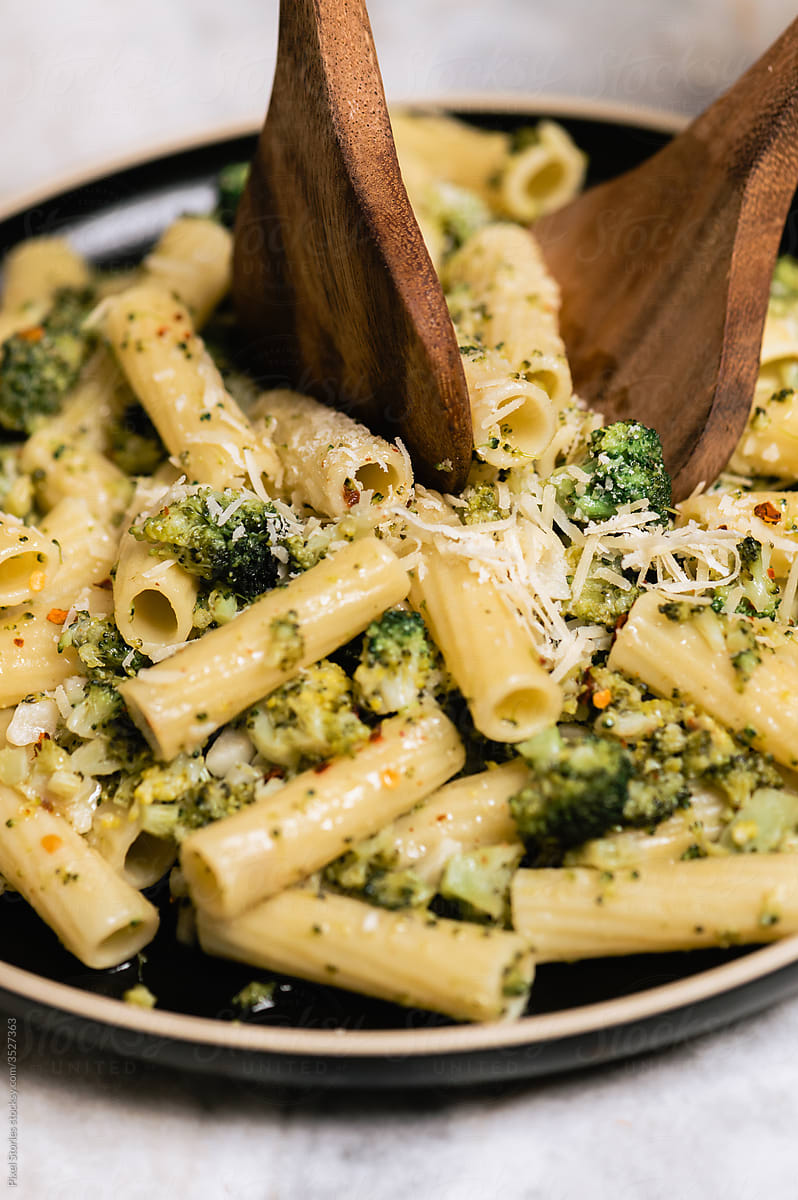 Macaroni pasta with broccoli and Parmesan cheese