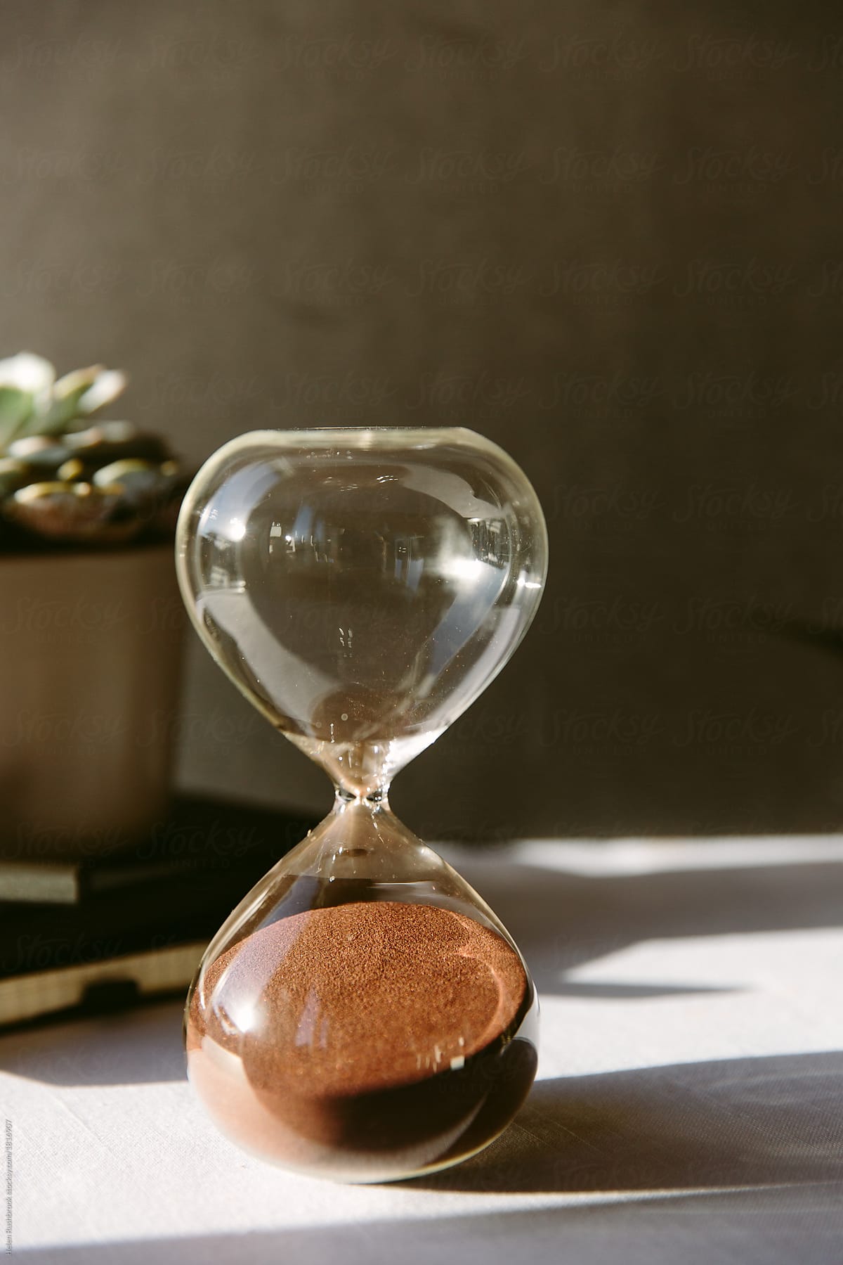 A sand timer through which all of the sand has run, indicating that time is up.