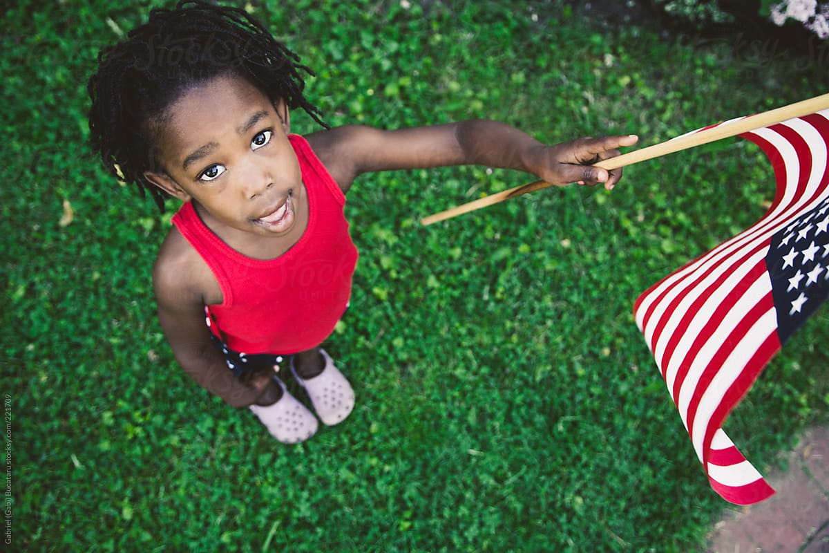 African American Girl In Red White And Blue Usa Flag Outfit Holding A Usa Flag Del