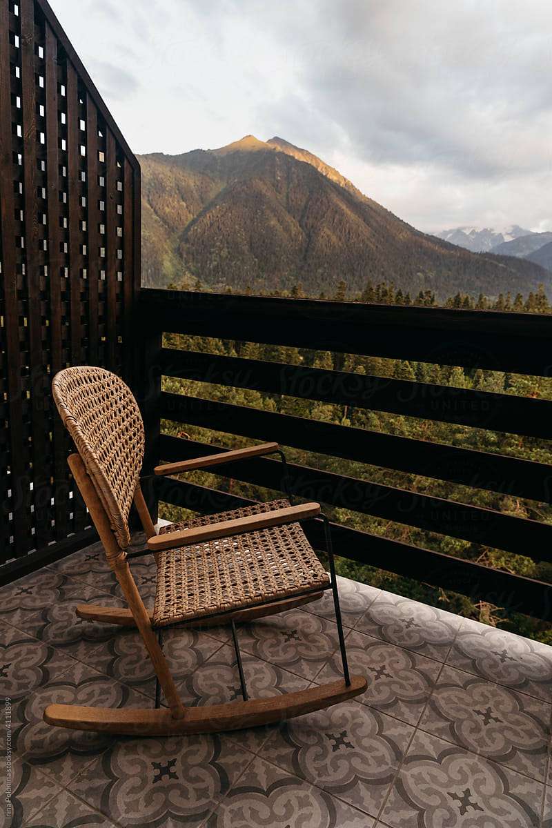 Beautiful view of the mountains and the green forest from the hotel balcony.