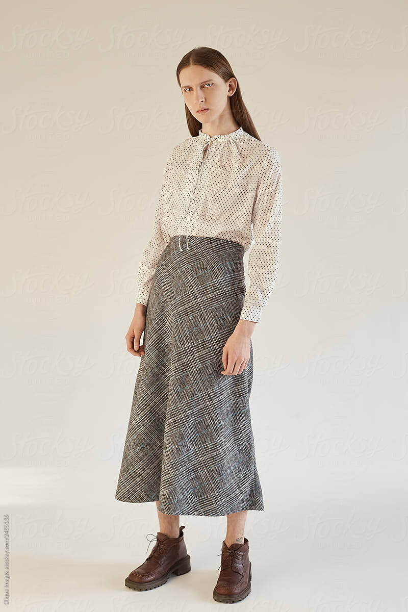 Androgynous Male In Skirt And Blouse by Clique Images