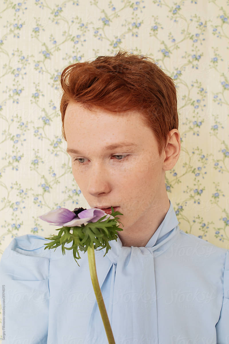 Ginger man with blue flower