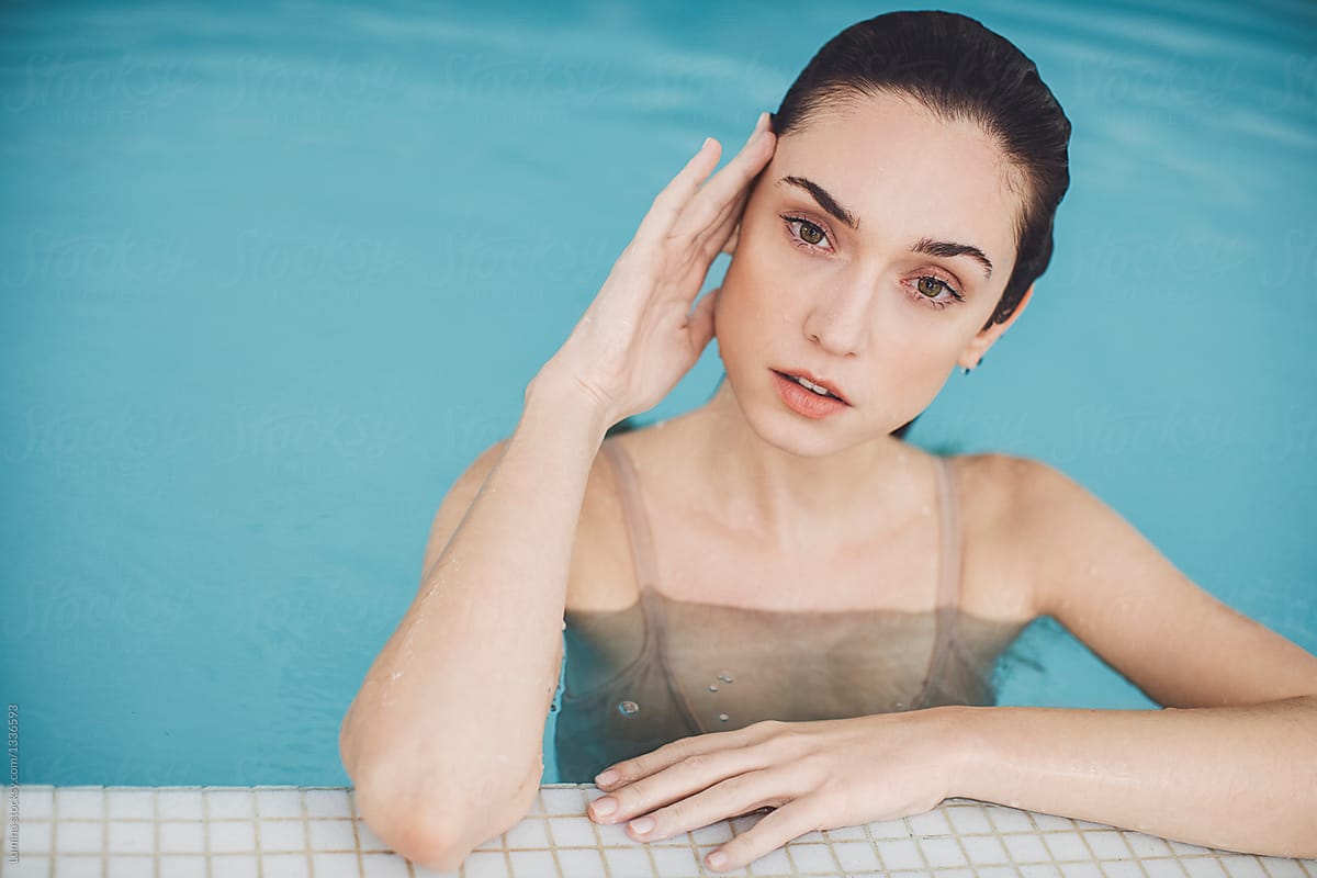 Portrait Of Beautiful Woman In Swimming Pool By Lumina 