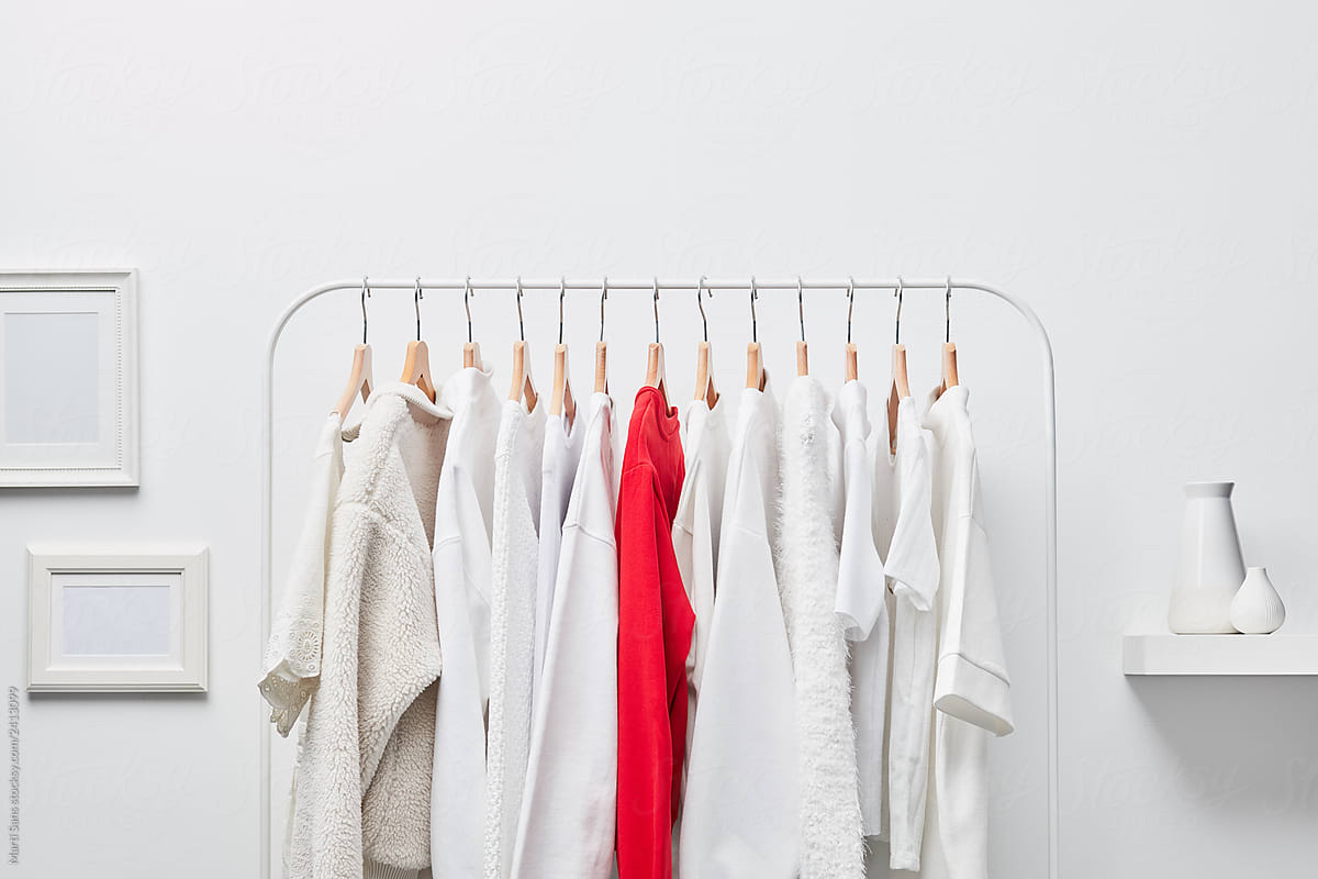 Collection Of Multicolored Clothing On Rack by Stocksy Contributor Martí  Sans - Stocksy