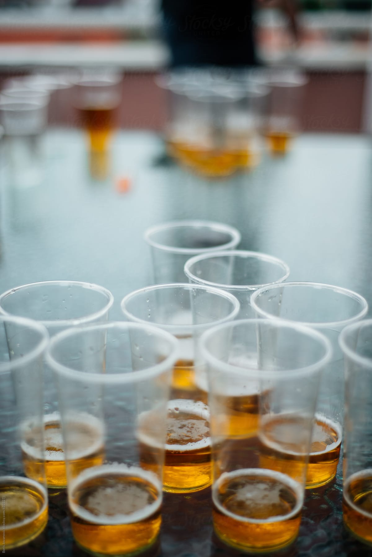 Beer pong glasses with beer