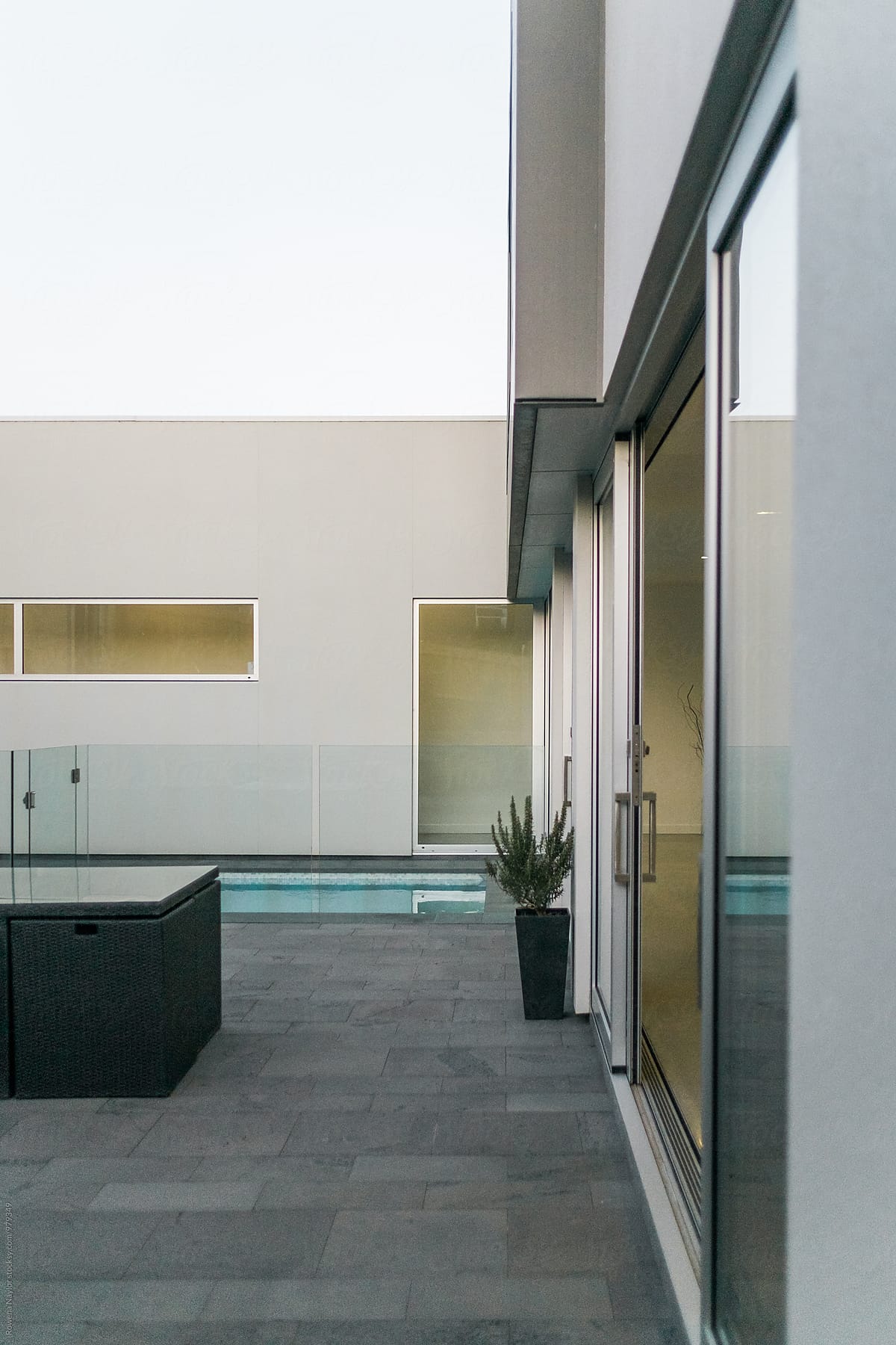 Architect designed home with plunge pool at twilight