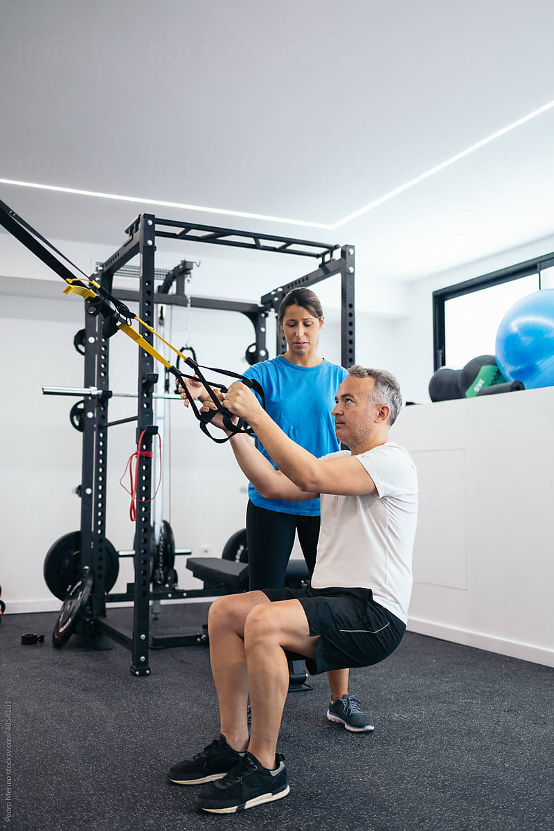 Man doing rehabilitation exercises with his physical therapist
