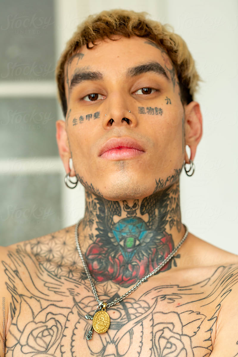 Face Tattoo Man Portrait" by Stocksy Contributor "Ohlamour Studio" - Stocksy