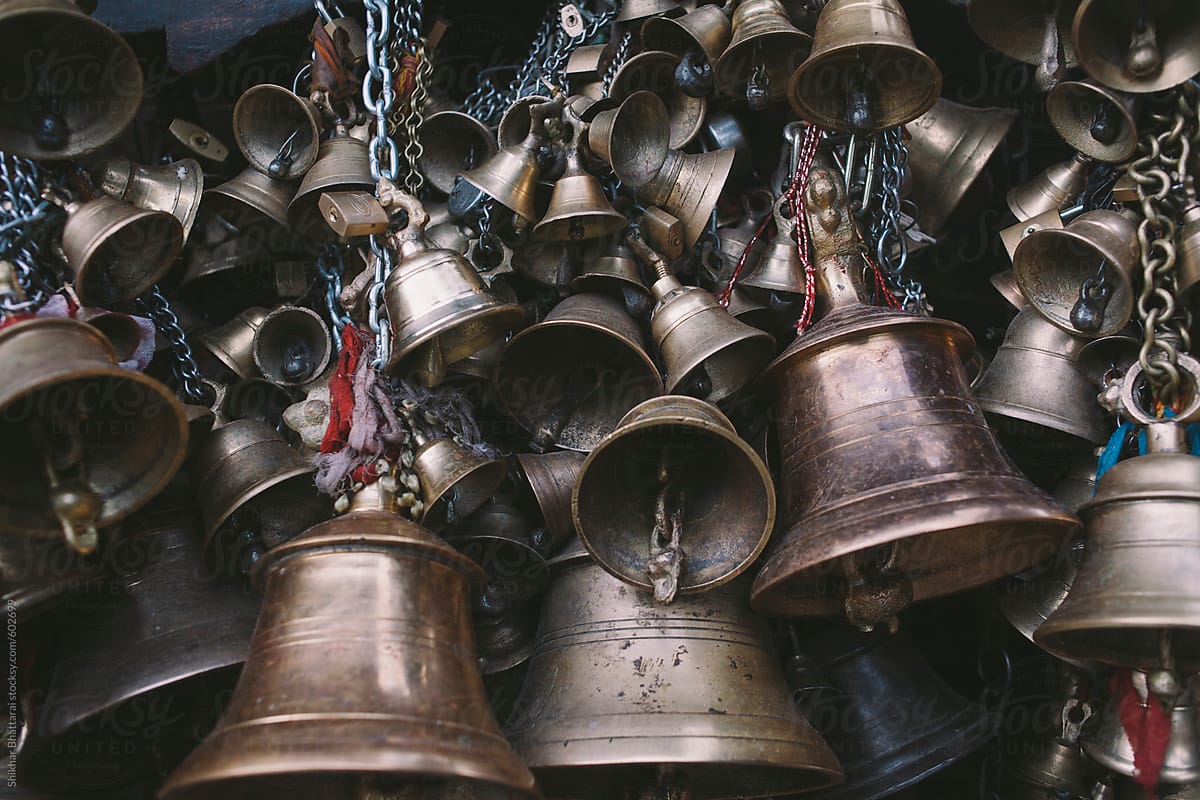 Background of many hanging bells inside a temple in Nepal.