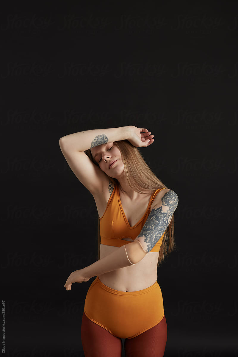 Disabled Girl With Tattoos Posing