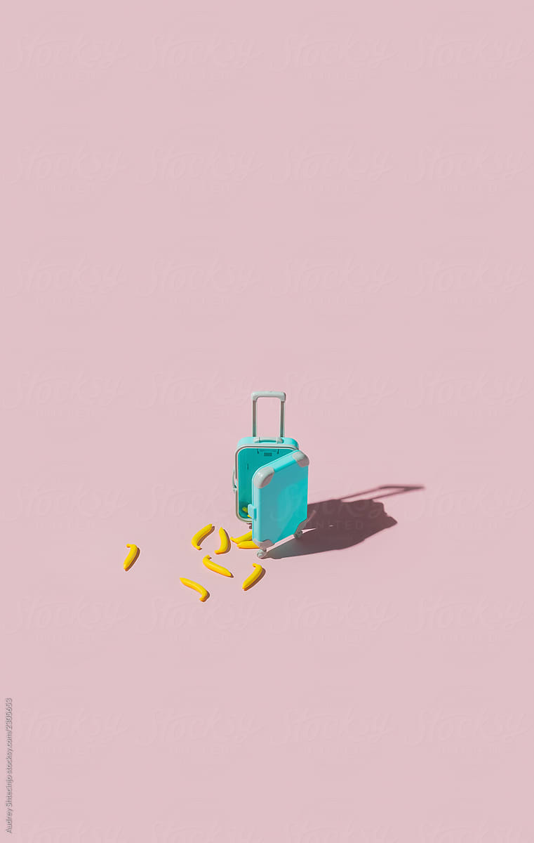 Blue suitcase / luggage full with bananas