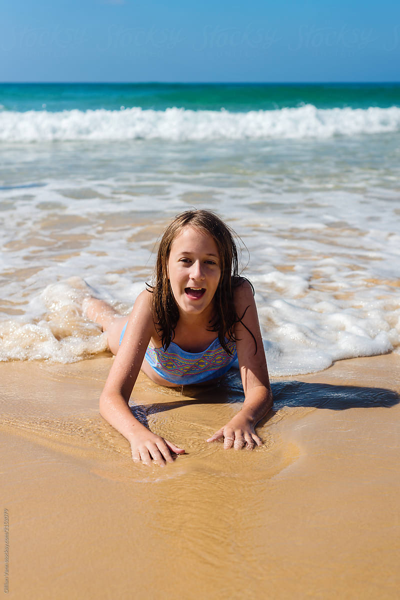 Young Tween Lying In The Surf By Gillian Vann Surf Beach