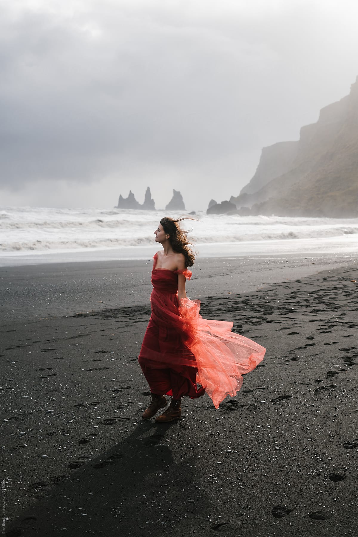 Yang Women In A Red Long Dress Walks On 