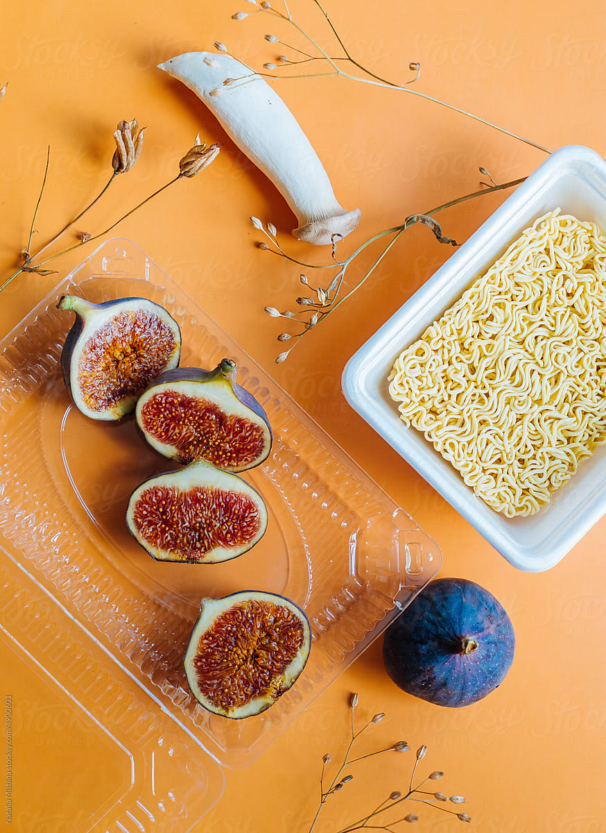 Still life with instant noodles and figs.