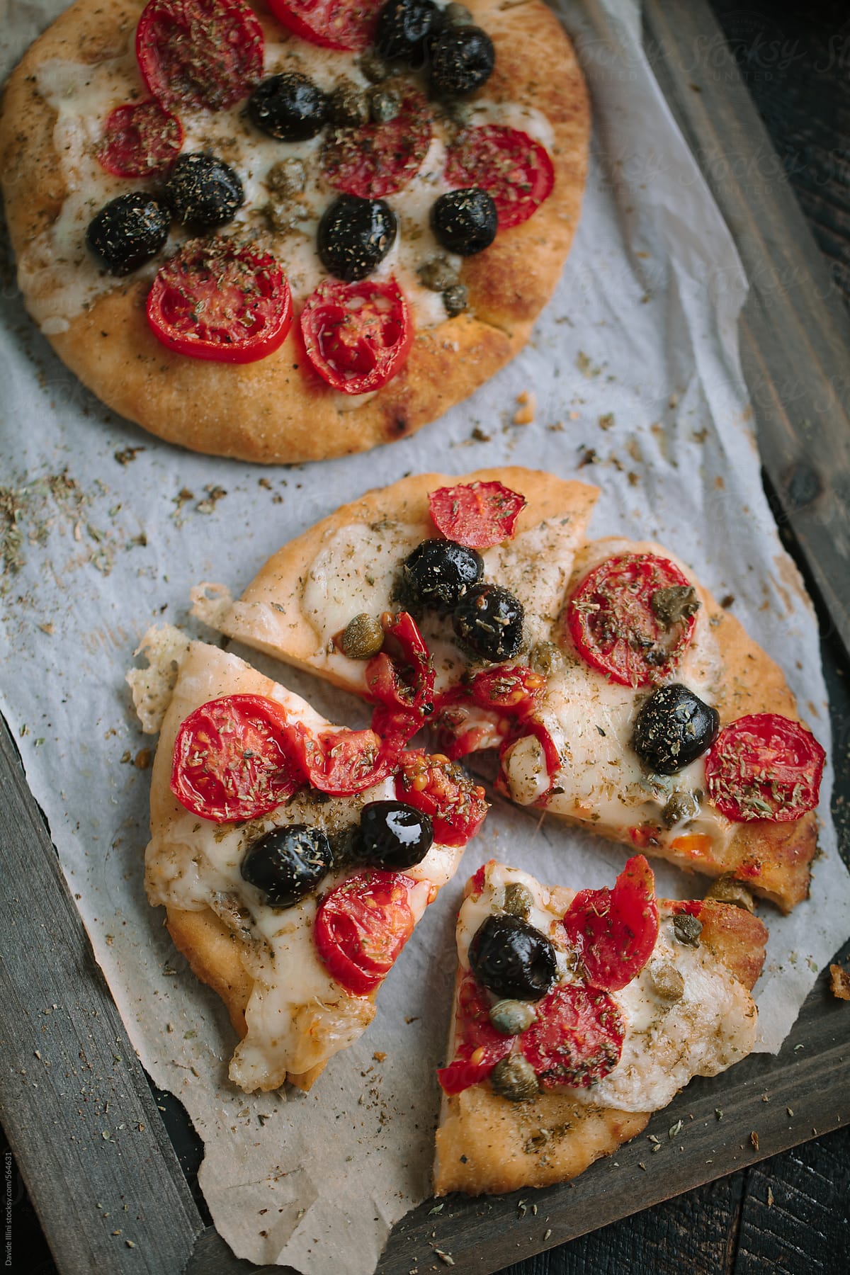 Italian focaccia with black olives and cherry tomatoes