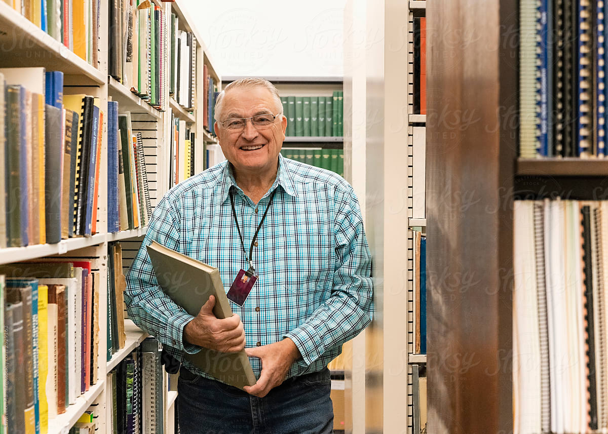 Librarian in the stacks at college museum library