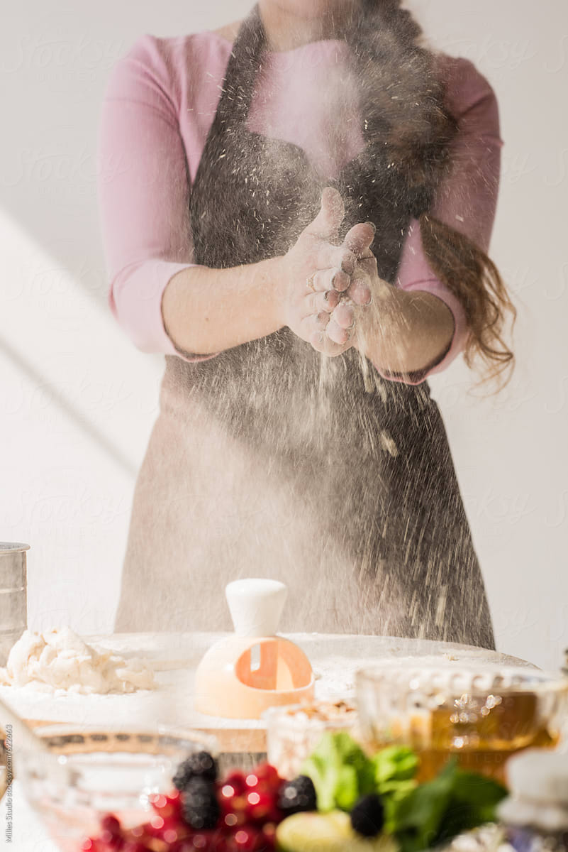 Woman Cooking Donuts