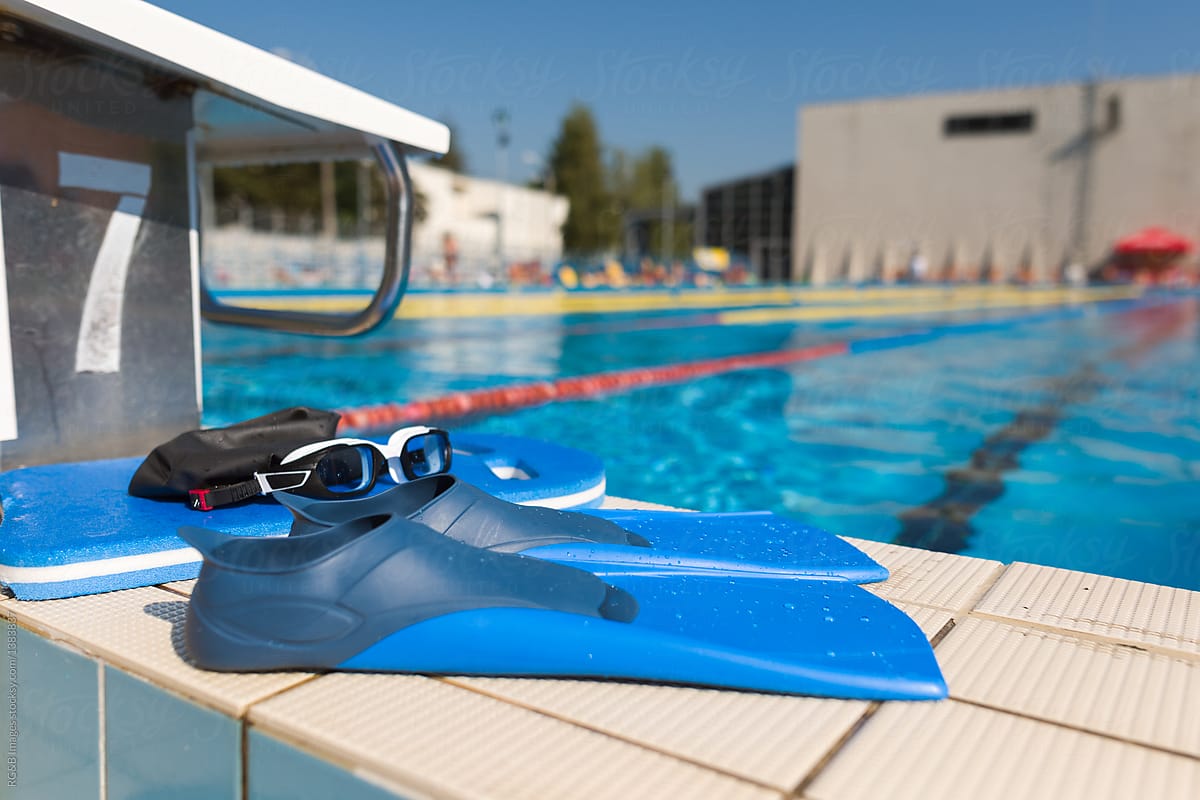 Close up on swimming equipment on the edge of the pool