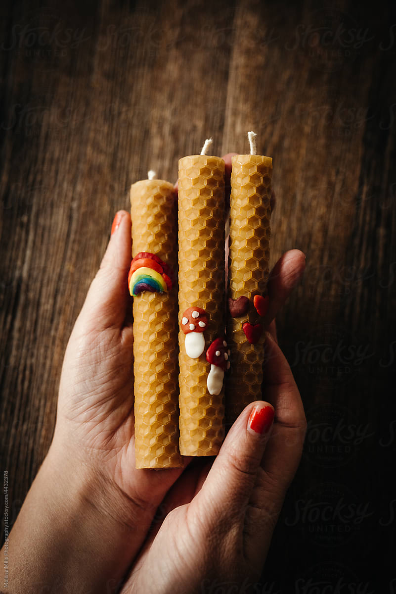 Handmade beeswax candles with decorations