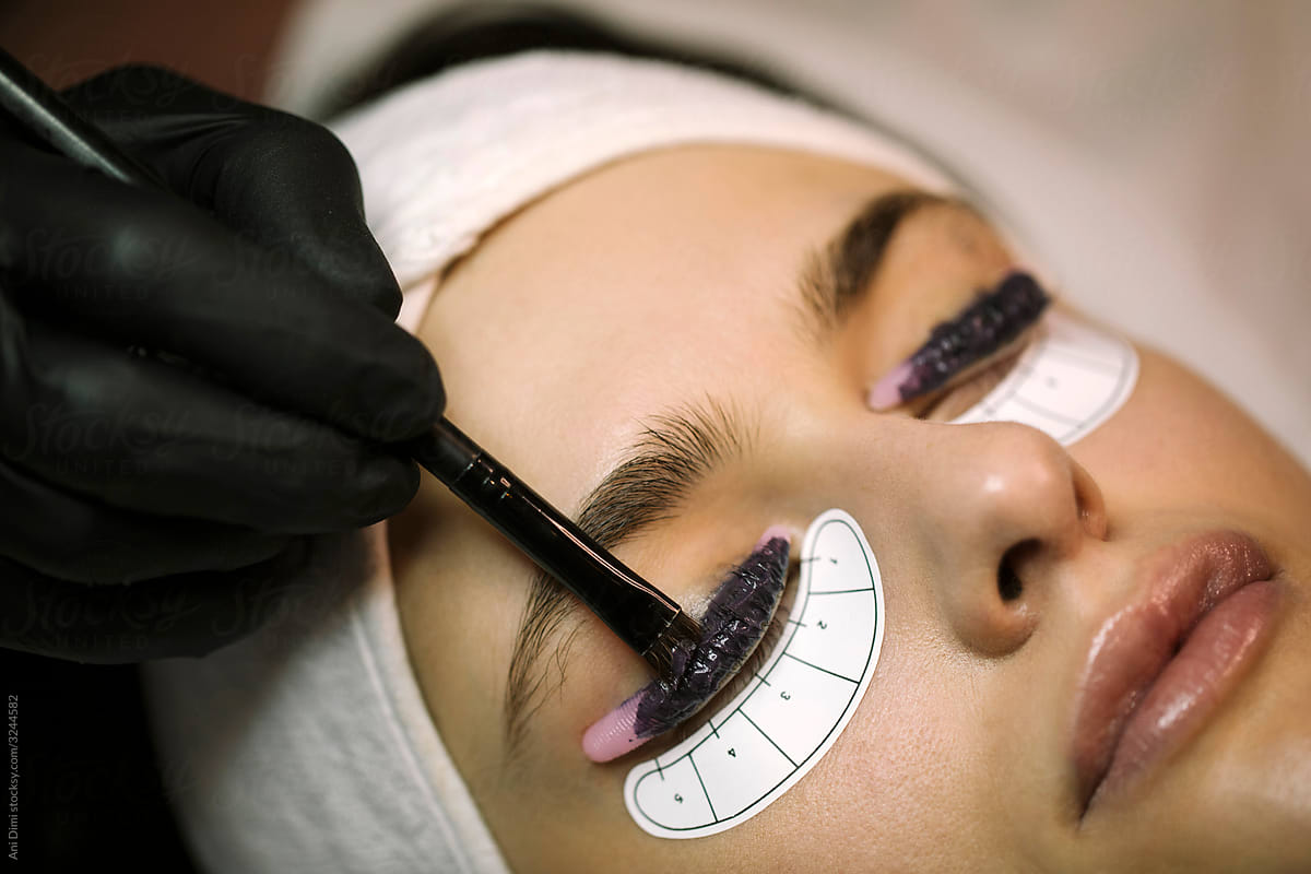 Young Woman Getting Dyeing  Eyelash Treatment