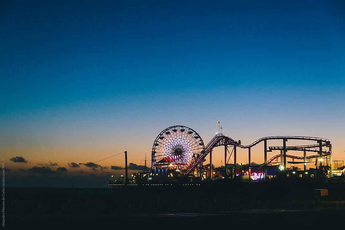 View of Santa Monica pier at dusk. Evening theme park