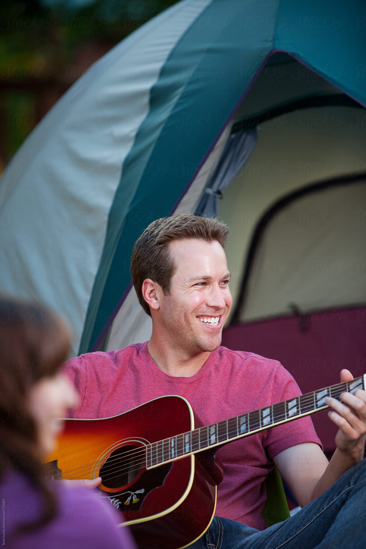 Camping: Guy Plays Guitar By Tent