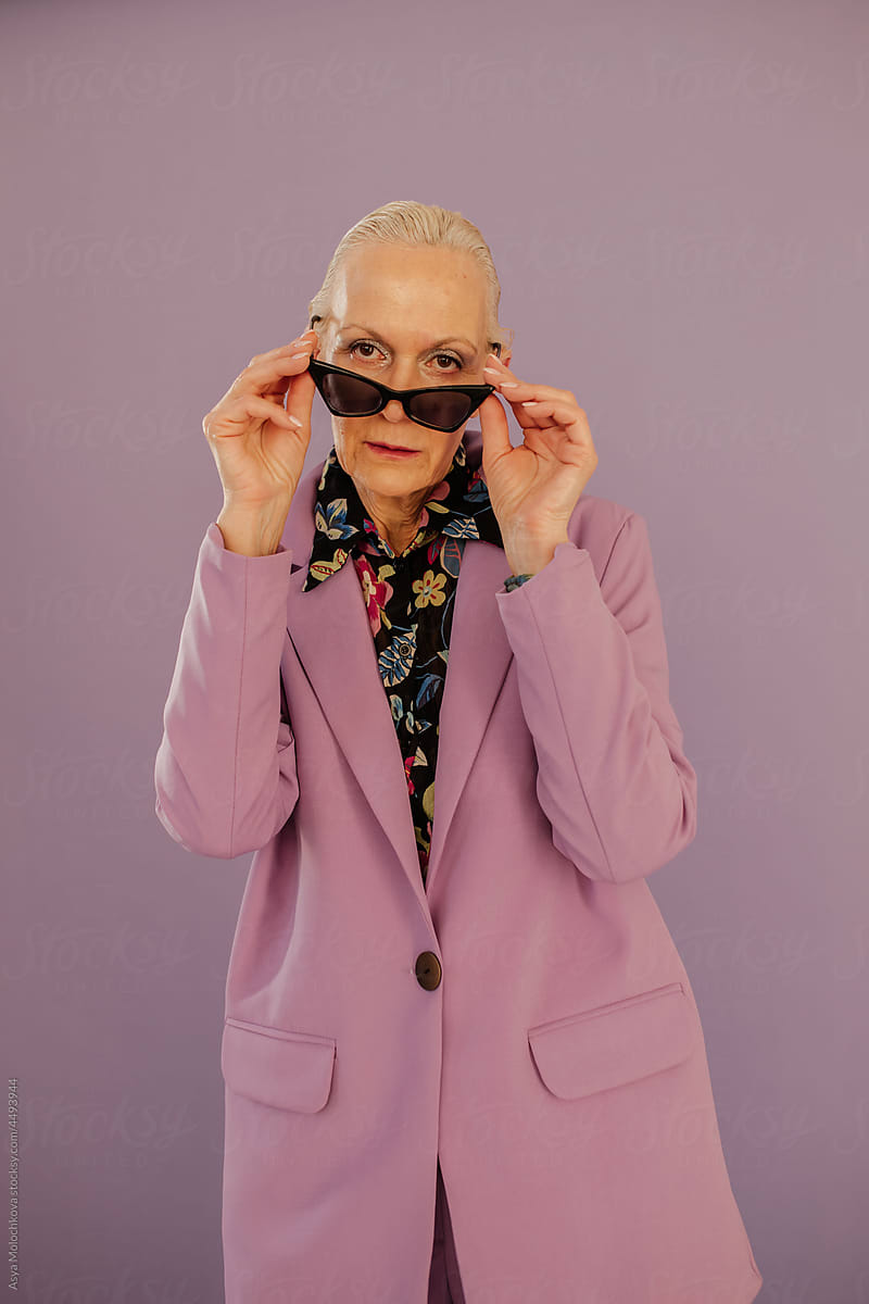 Self-confident senior woman in trendy outfit