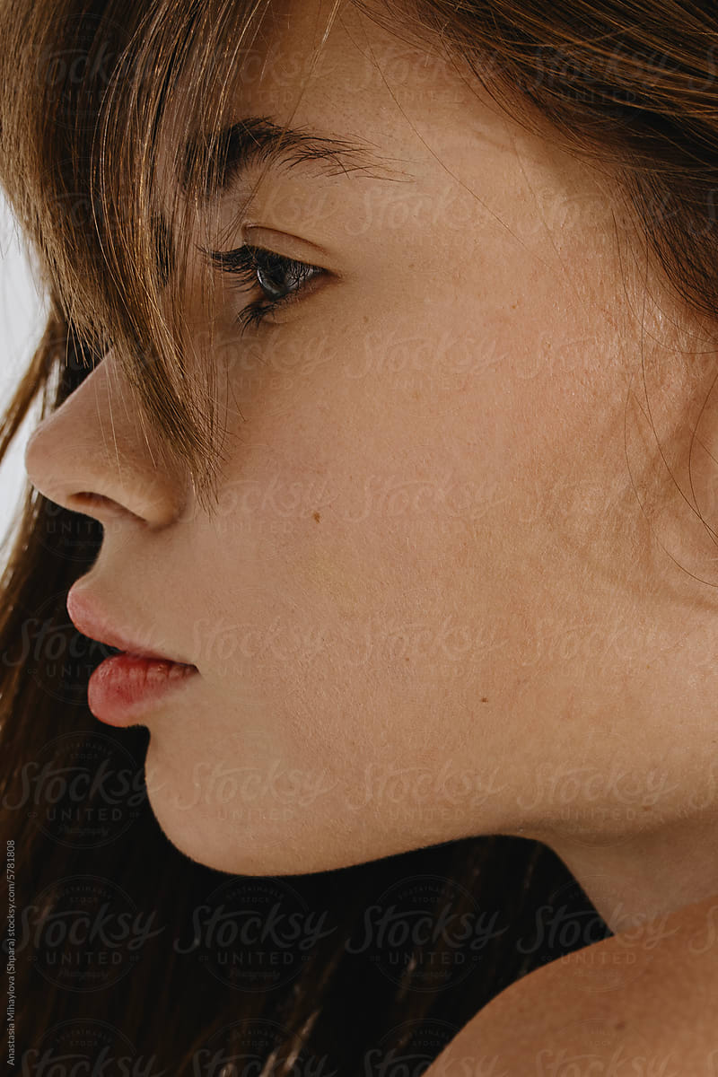Close Up woman\'s portrait face profile with natural big lips