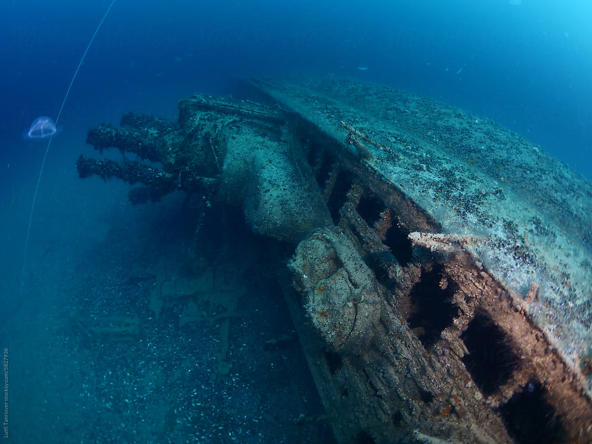 wreck underwater laying seabed metal on ocean floor