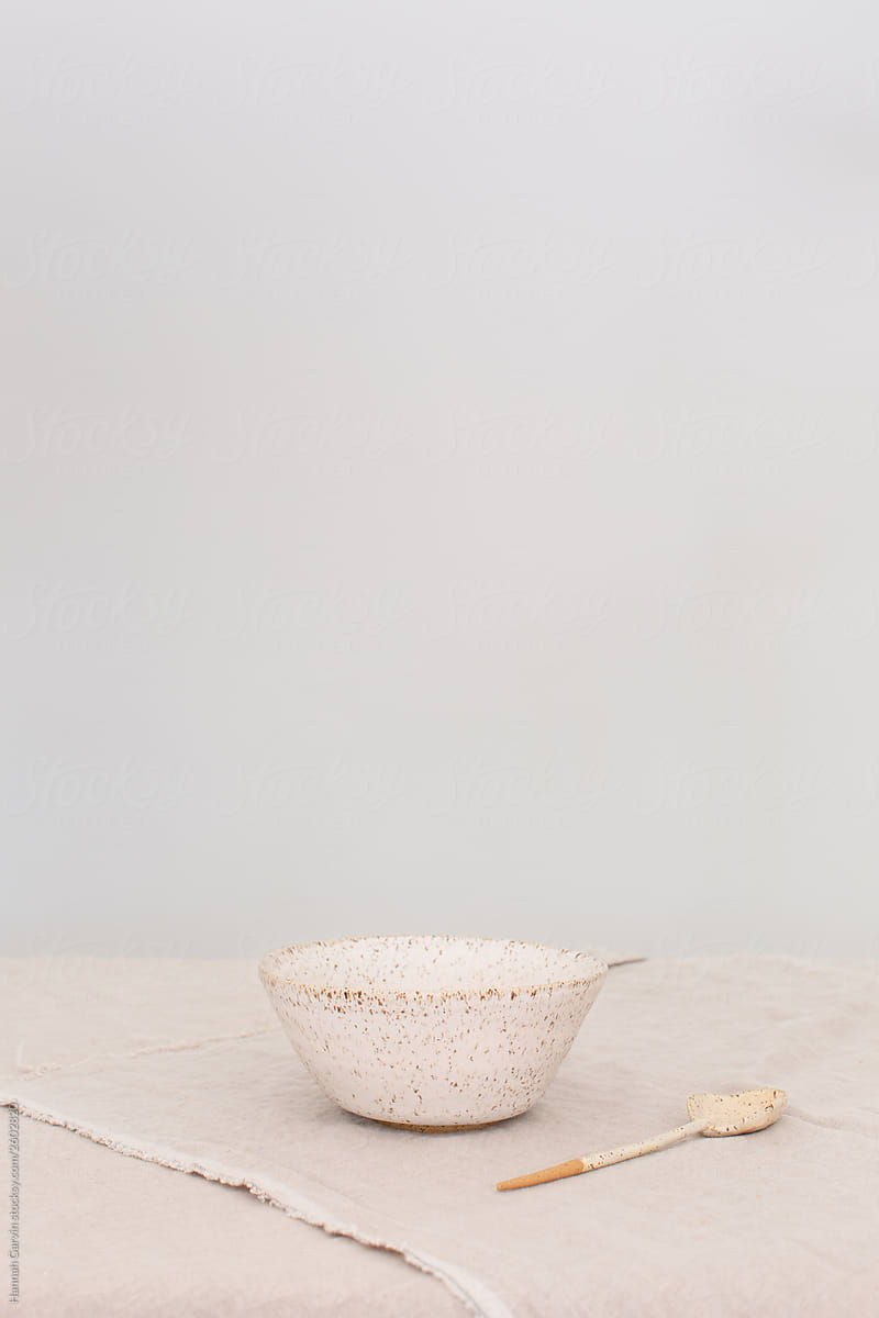 Handmade Ceramic Bowl and Spoon on Table