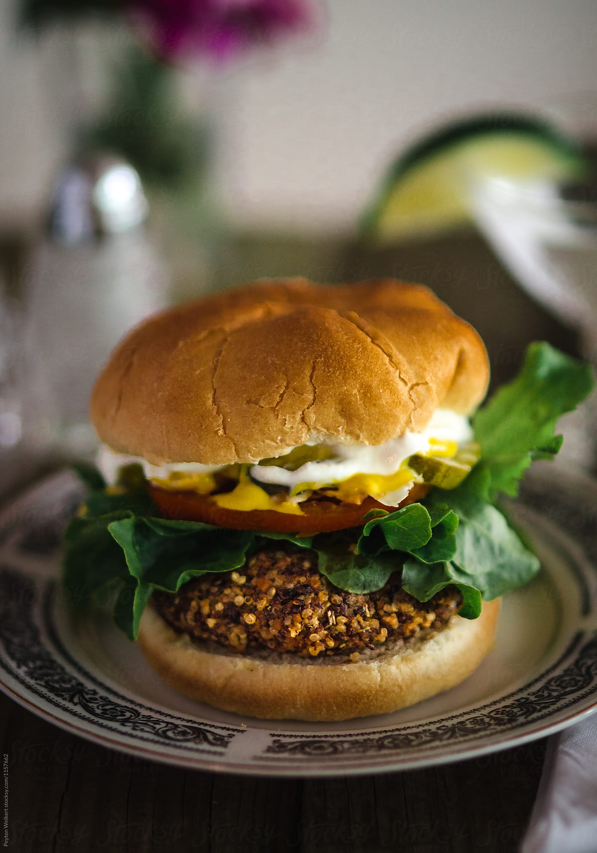 Quinoa Burger Served with Vegetables on a Kaiser Roll