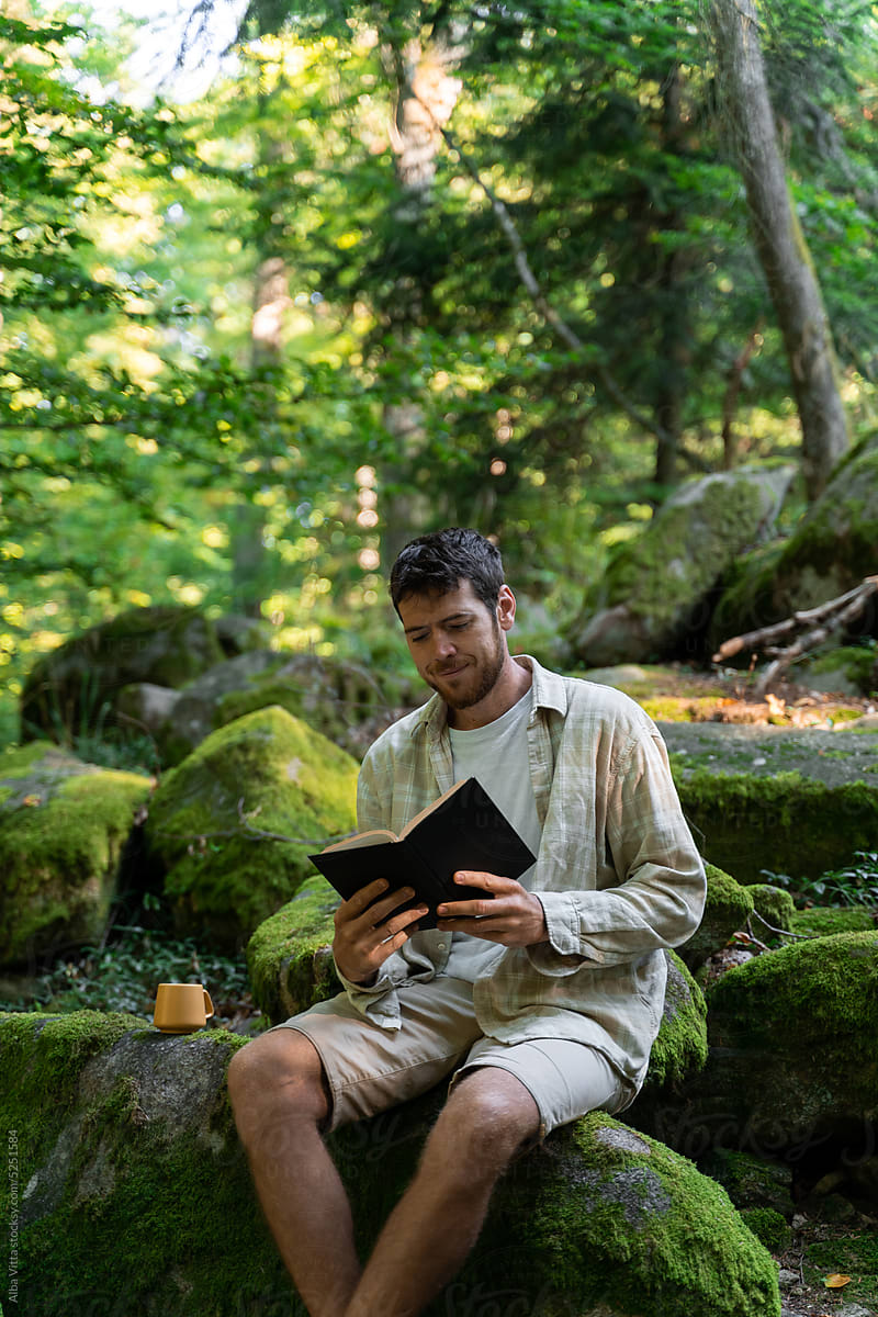 Man read book in nature